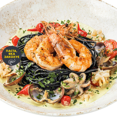 Black pasta with seafood and lemon sauce