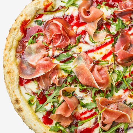Pizza Quattro Formaggi with parma and raspberry coulis