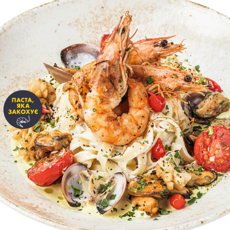 Tagliatelle with seafood in truffle-lemon sauce