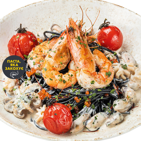 Black pasta with seafood and caviar