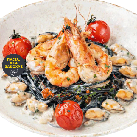 Black pasta with seafood and caviar